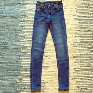 Divided by H&M medium wash skinny jeans